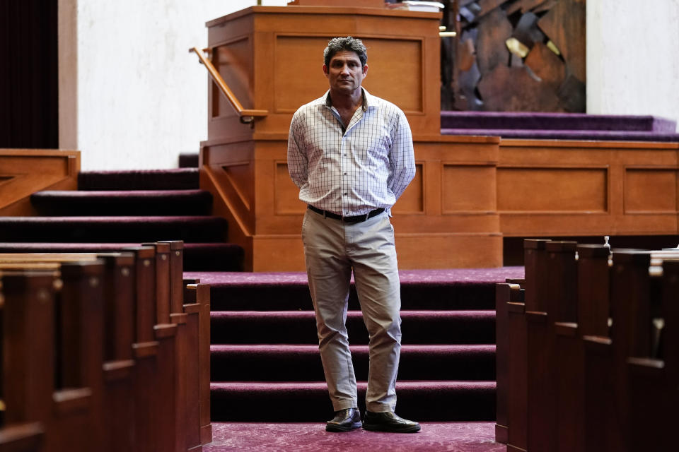 Rabbi Shai Cherry poses for a photograph at Congregation Adath Jeshurun in Elkins Park, Pa., Monday, April 26, 2021. Antisemites adopted a new tactic for spewing their hate when the COVID-19 pandemic closed synagogues and Jewish schools and community centers: Hijacking video conferences. On the morning of June 27, 2020, Rabbi Shai Cherry was leading a Shabbat service on Zoom for his congregation in a Philadelphia suburb when several guests with suspicious usernames began posting pornographic images and antisemitic messages like "Hitler should have finished the job." One of them posted Cherry's home address. (AP Photo/Matt Rourke)