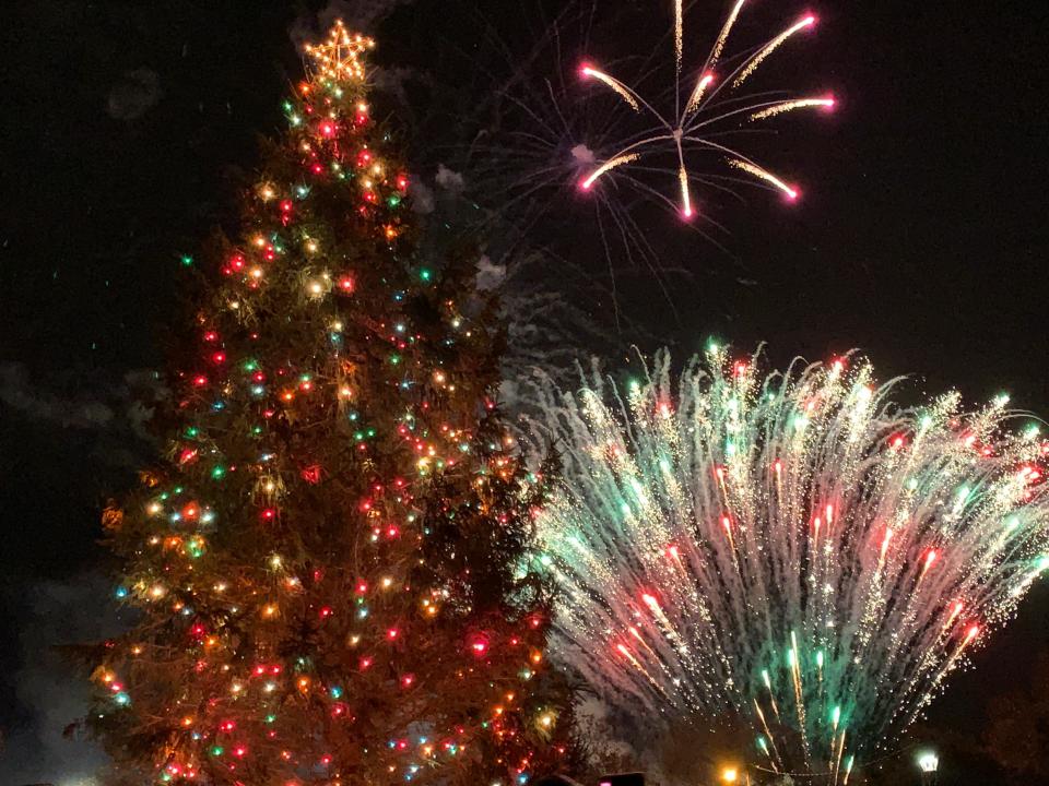 Holiday lights fill the air during the Christmas Tree Light-Up and Fireworks Spectacular at the Augusta Common in 2019.