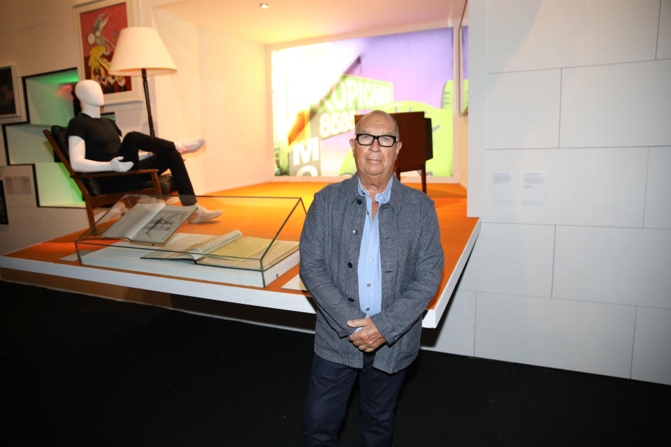 Aubrey Powell, Hipgnosis co-founder and co-curator of “The Pink Floyd Exhibition: Their Mortal Remains,” in front of a set for a “The Wall” tour - Credit: Alex Kluft