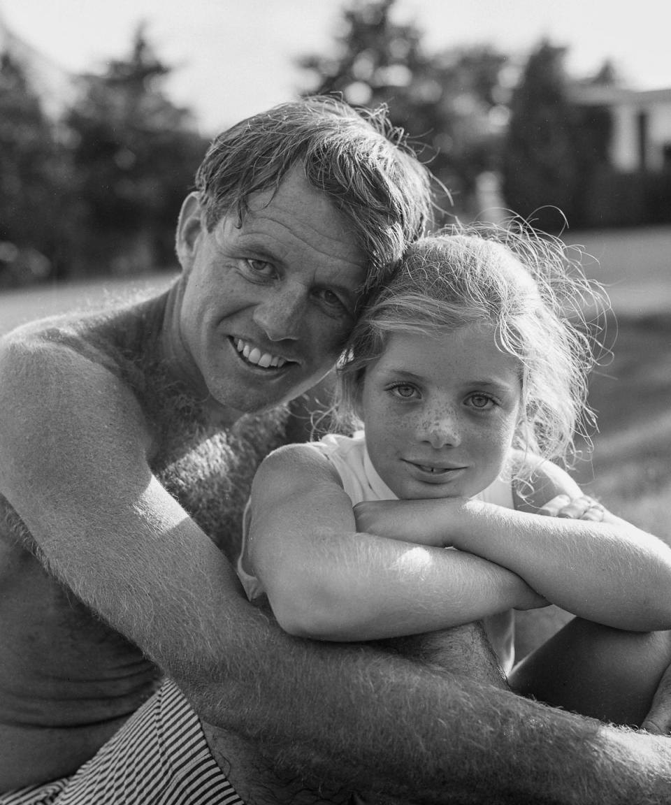 Robert F. Kennedy with his Niece Caroline at the family compound in Hyannis Port, 1964