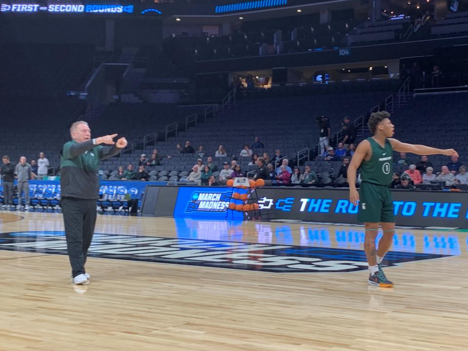 Jeremy Fears and Tom Izzo talk during Michigan State basketball's open practice Wednesday, March 20, 2024, at Spectrum Center in Charlotte, N.C. The Spartans face Mississippi State in the NCAA tournament, but Fears remains out after being shot in December 2023.