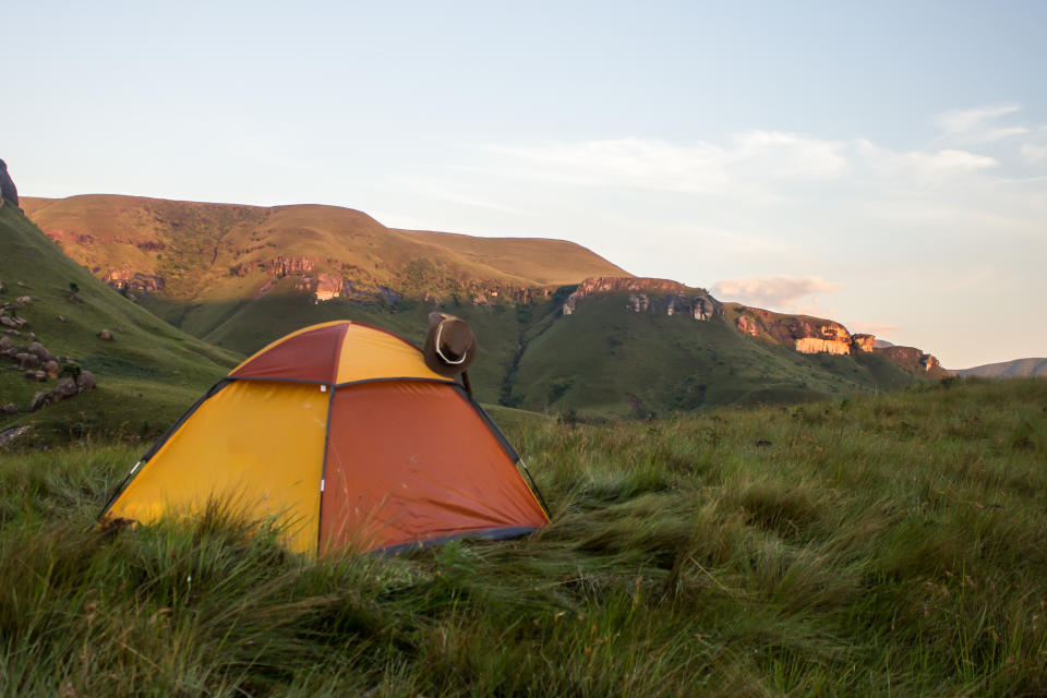 Wild Camping, a single, bright orange hiker