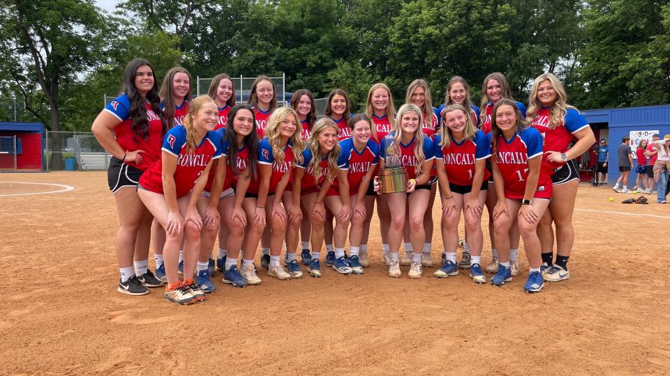 Roncalli junior pitcher Keagan Rothrock poses for a photo with her teammates after being named Gatorade National Softball Player of the Year on Wednesday, June 8, 2022.