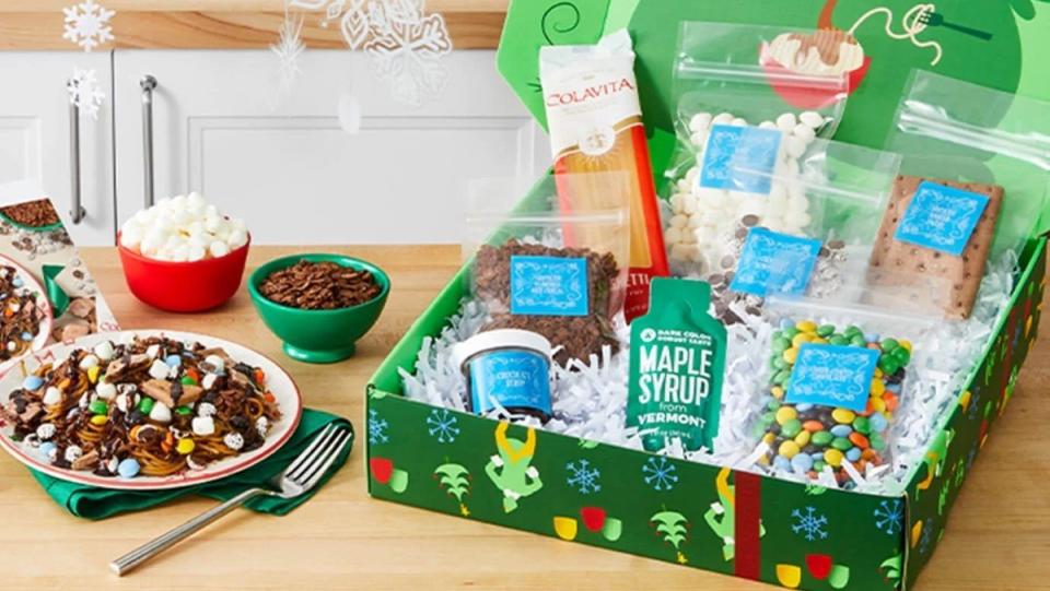 The Hello Fresh Elf chocolate spaghetti meal kit with ingredients and a plate of the meal