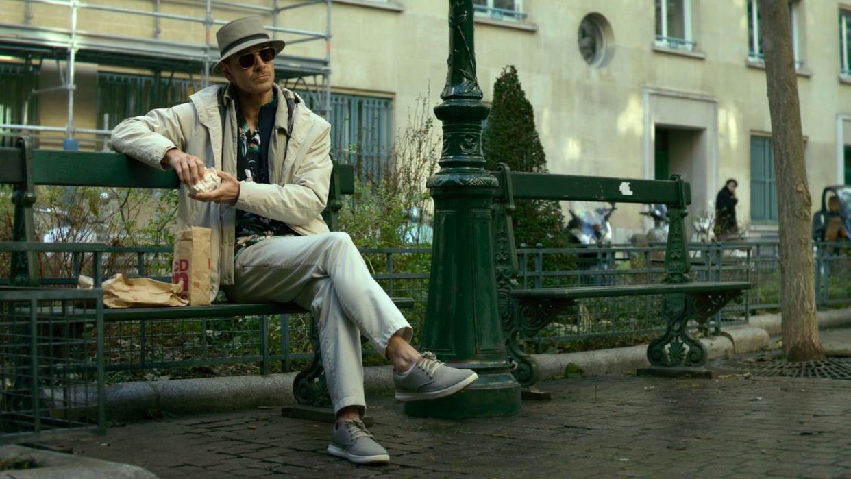 a person sitting on a bench