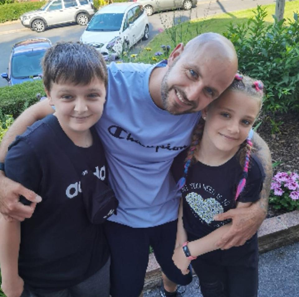 John Paul Bennett and Lacey Bennett with their father Jason (PA)