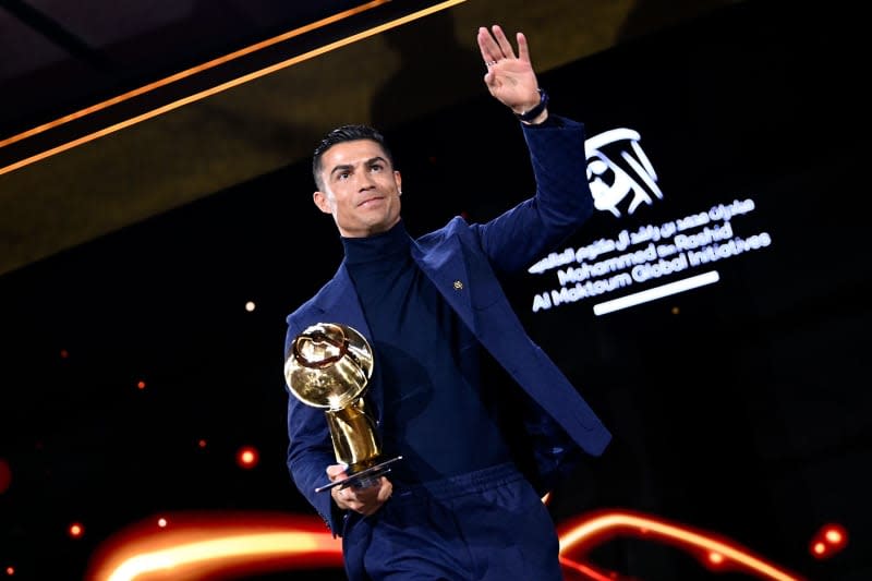 Portuguese player Cristiano Ronaldo receives the lifetime achievement award during the 14th edition of the Dubai Globe Soccer Awards 2024. Fabio Ferrari/LaPresse via ZUMA Press/dpa