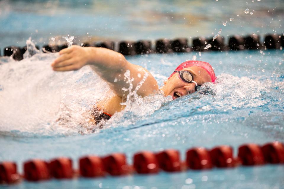 Hope's Ashlea Swingewood competes in the 200 yard freestyle Friday, Jan. 27, 2023, at the Venema Aquatic Center at Calvin University. 