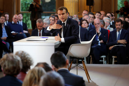 French President Emmanuel Macron speaks during a news conference to unveil his policy response to the yellow vests protest, at the Elysee Palace in Paris, France, April 25, 2019. REUTERS/Philippe Wojazer