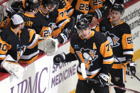 Pittsburgh Penguins' Evgeni Malkin returns to the bench after scoring during the first period of an NHL hockey game against the San Jose Sharks in Pittsburgh, Saturday, Jan. 28, 2023. (AP Photo/Gene J. Puskar)