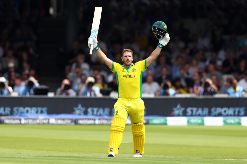 Aaron Finch of Australia celebrates reaching his century. (Credit: Getty Images)