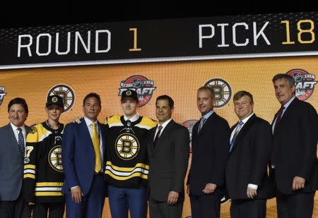 June 23, 2017; Chicago, IL, USA; Urho Vaakanainen poses for photos after being selected as the number eighteen overall pick to the Boston Bruins in the first round of the 2017 NHL Draft at the United Center. Mandatory Credit: David Banks-USA TODAY Sports