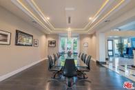 <p>The stairway opens up to a huge formal dining room. <br> (Realtor.com) </p>