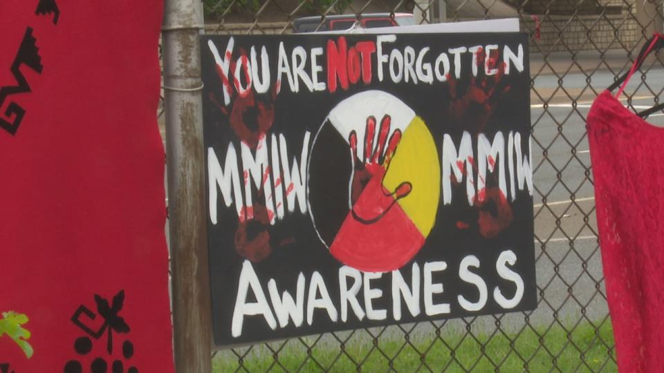 A sign at the Red Dress Day gathering at the Can-Am Indian Friendship Centre in Windsor on May 5, 2024.