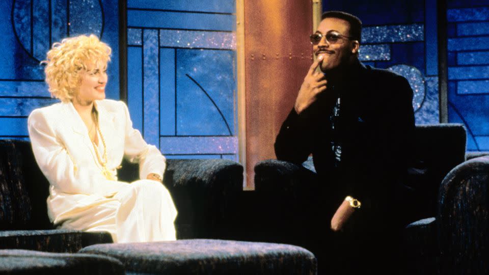 Madonna and Arsenio Hall on his late night talk show.  - Paramount/Everett Collection