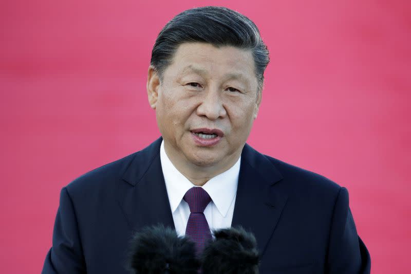 Chinese President Xi Jinping speaks following his arrival at Macau International Airport in Macau