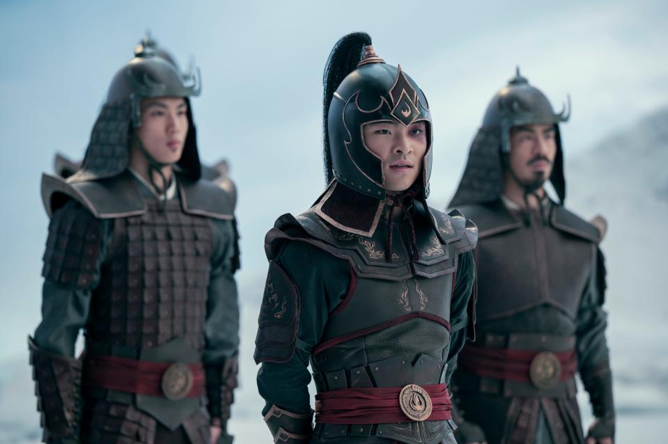 zuko accompanied by two fire nation soldiers in avatar, each wearing helmets