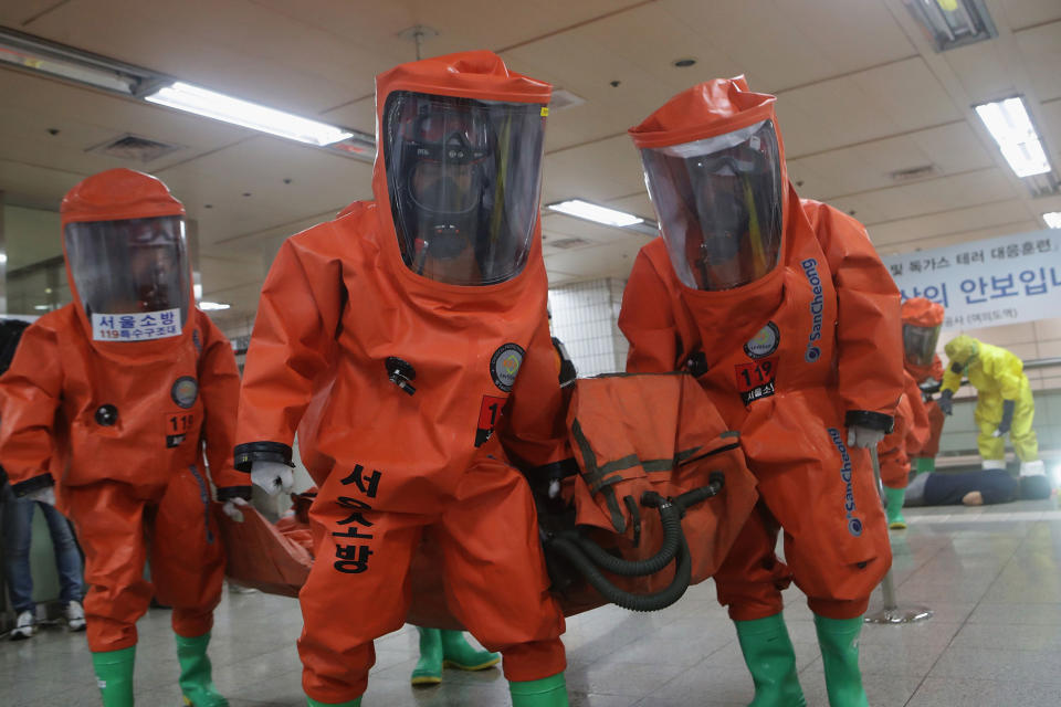 <p>Emergency services personnel wearing protective clothing participate in an anti-terror and anti-chemical terror exercise as part of the 2016 Ulchi Freedom Guardian (UFG) at Yeoui subway station on Aug. 23, 2016 in Seoul, South Korea. The 12 days exercise, which features drills including the handling of chemical and biological attacks, is a regular joint exercise between U.S. and South Korean troops to prepare for potential emergencies on the Korean Peninsula. (Chung Sung-Jun/Getty Images) </p>