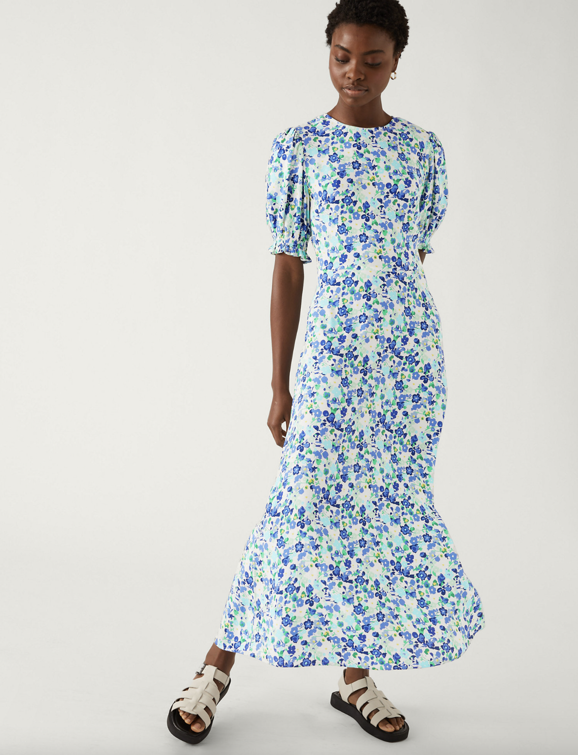 The floral dress can be easily dressed up and down. (Marks & Spencer)