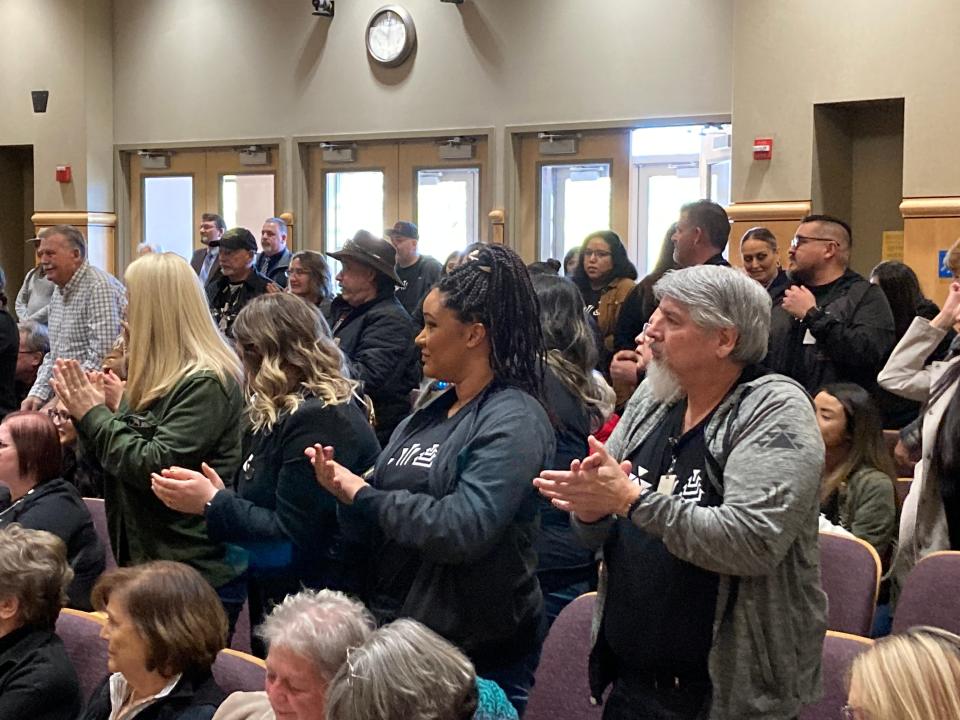 Redding Rancheria supporters stand up and clap after the Shasta County Board of Supervisors reaffirmed its support on Tuesday, Jan. 24, 2023, of the tribe's plans to relocate its Win-River Casino