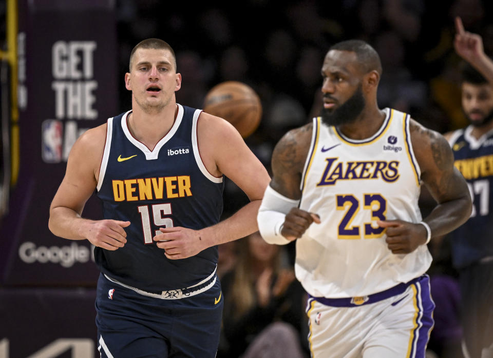 LOS ANGELES, CA - APRIL 27: Nikola Jokic (15) of the Denver Nuggets and LeBron James (23) of the Los Angeles Lakers square off during the first half at Crypto.com Arena in Los Angeles on Saturday, April 27, 2024. (Photo by AAron Ontiveroz/The Denver Post)