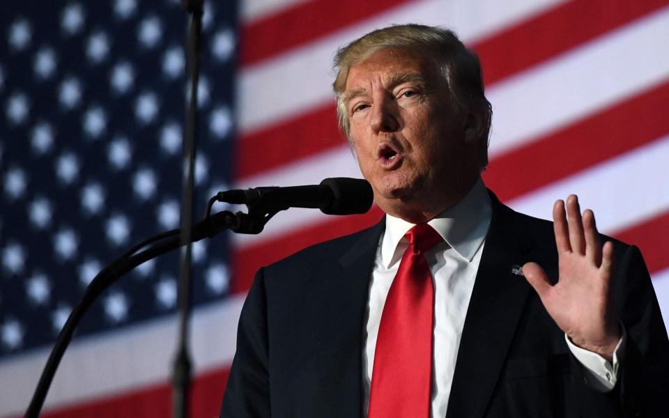 Mr Trump speaks during a campaign rally in Bedford, New Hampshire, on September 29, 2016 - JEWEL SAMAD