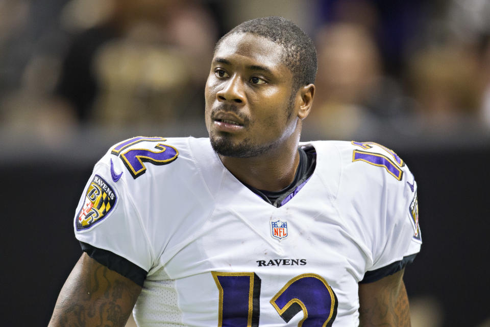 NEW ORLEANS, LA - NOVEMBER 24: Jacoby Jones #12 of the Baltimore Ravens warms up before a game against the New Orleans Saints at Mercedes-Benz Superdome on November 24, 2014 in New Orleans, Louisiana. The Ravens defeated the Saints 34-27. (Photo by Wesley Hitt/Getty Images)