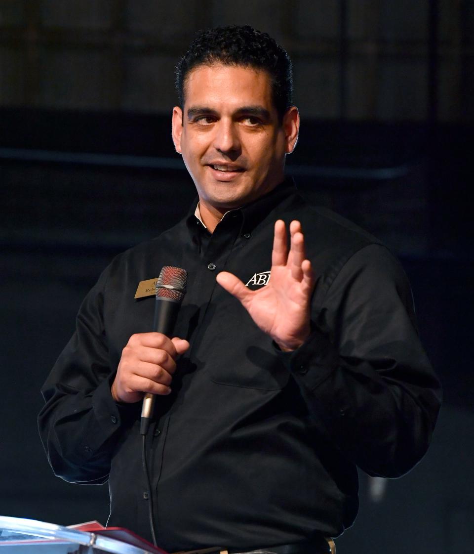 Abilene Convention and Visitors Bureau Vice President Robert Lopez emcees the award presentation during Tuesday's Hero of Tourism Awards. Lopez took over as ACVB's leader this year.