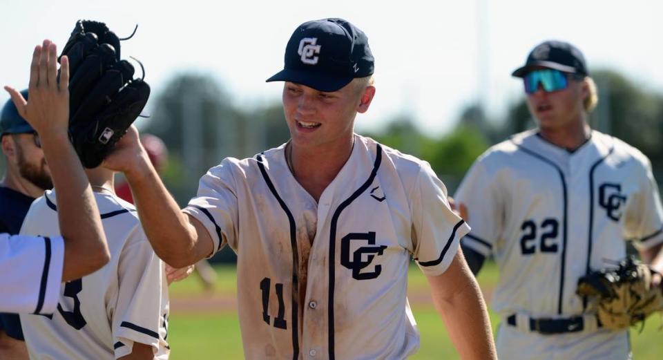 Central Catholic pitcher TP Wentworth enters the dugout after pitching during Game 1 of the CIF Sac-Joaquin Section D-III semifinals against Oakdale at Oakdale High School on Monday, May 13, 2024. Central Catholic took a 1-0 series lead with an 8-1 win.