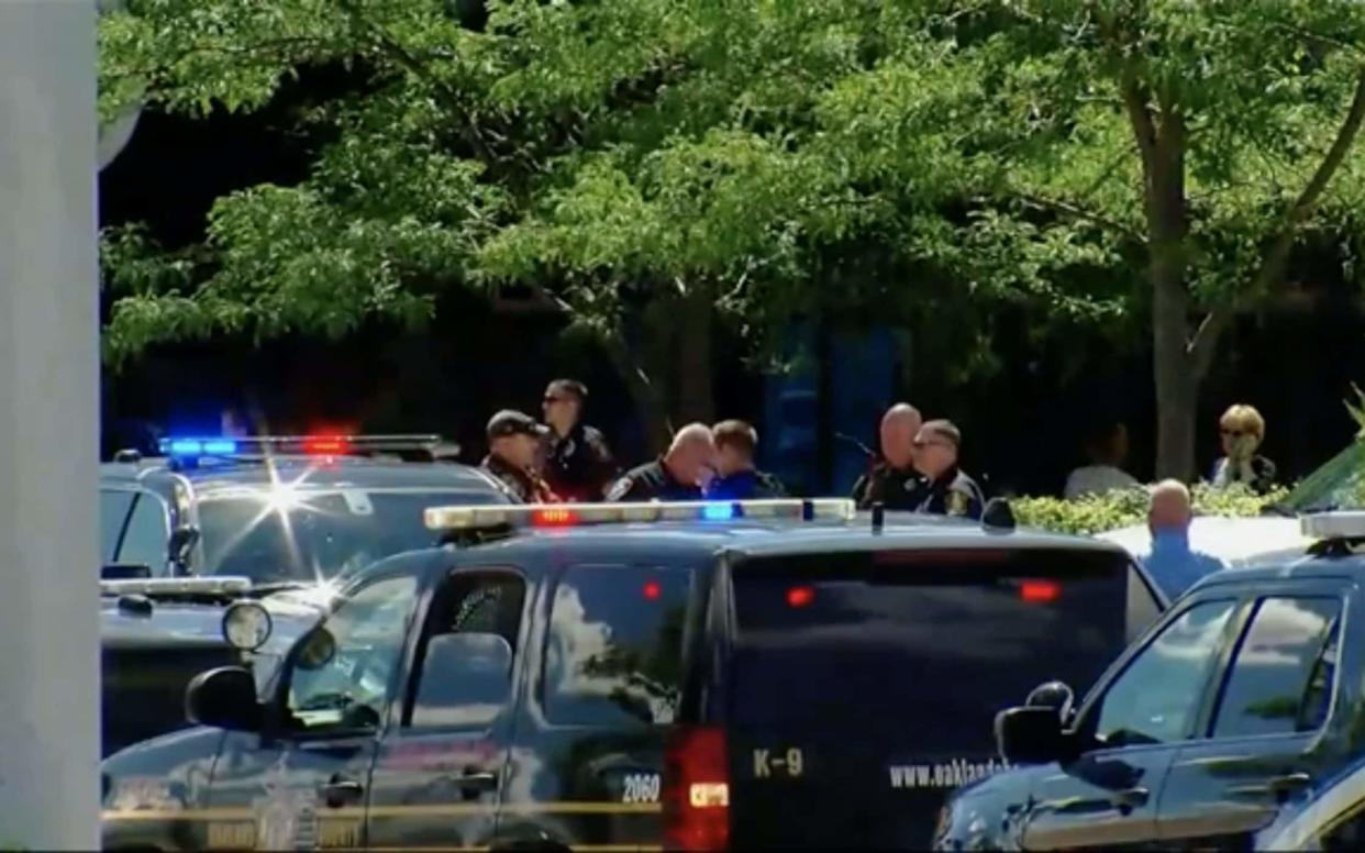 Police outside the airport in Flint, Michigan after a policeman was stabbed in the neck - APTN