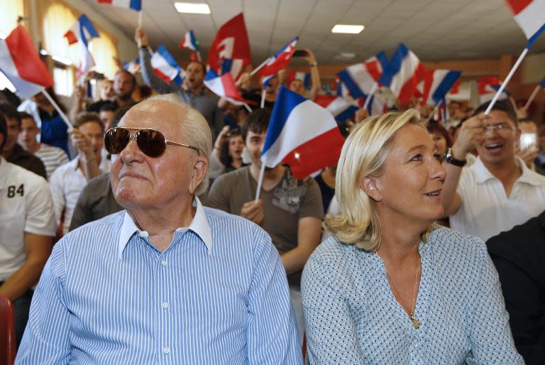 French far-right leader Marine Le Pen and her father Jean-Marie Le Pen on September 7, 2014 in Frejus, France