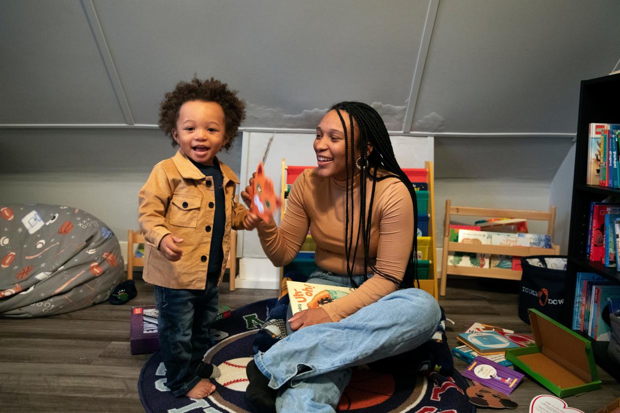 Arin Gentry plays with her 19-month-old son Kyrin Burton in their apartment in Evanston on Tuesday, March 1, 2022. Gentry started a Black literature book drive when she was pregnant in the summer of 2020.