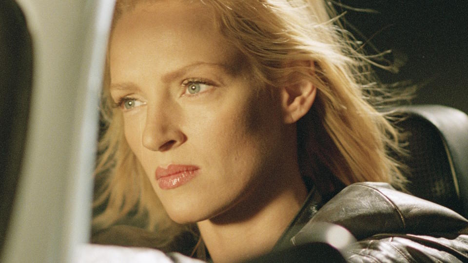 Uma Thurman drives a car in Kill Bill Vol. 2