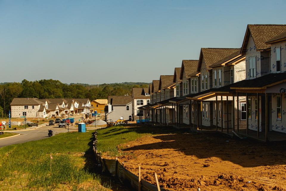 Homes in various stages of construction stand on the drumwright property in Columbia, Tenn. on Apr. 20, 2023. 