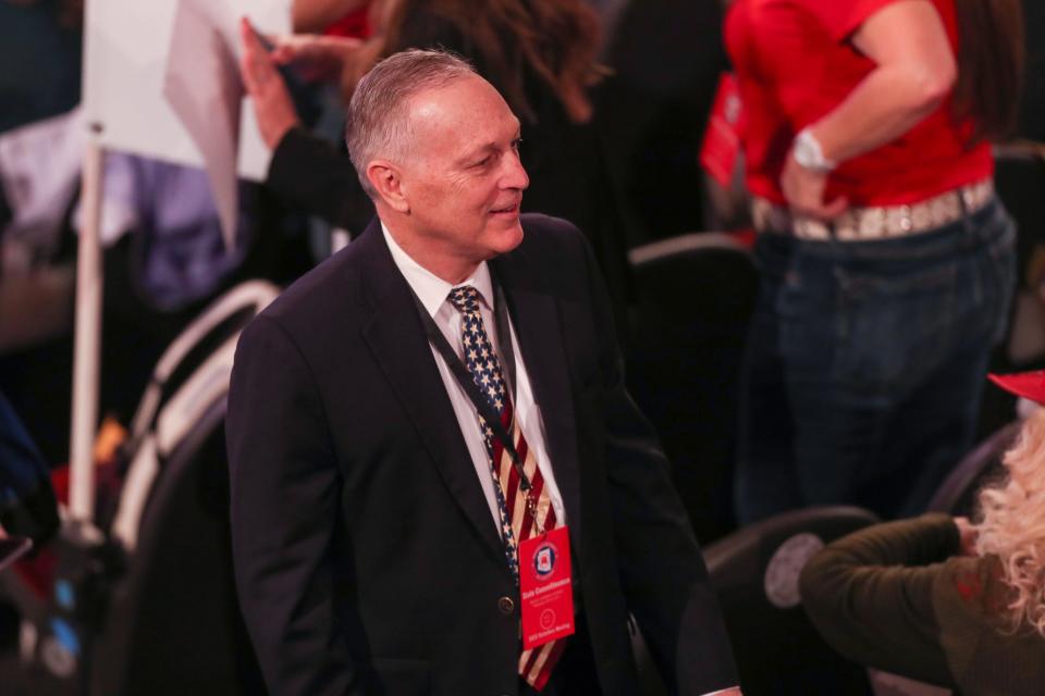 Rep. Andy Biggs greets attendees during the Arizona GOP biennial statutory meeting at Dream City Church on Saturday, Jan. 28, 2023, in Phoenix.