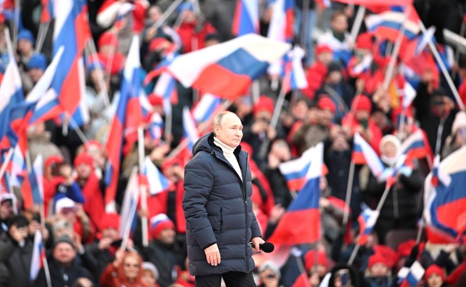 Vladimir Putin seen at a pro-war rally in Moscow on Friday, March 18.