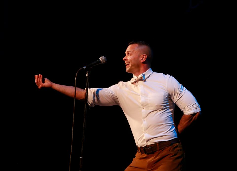 Erik Dominguez shares his story about a journey back to his childhood home in Tucson during the Des Moines Register's Storytellers Project at Hoyt Sherman Place on Tuesday, June 14, 2022.