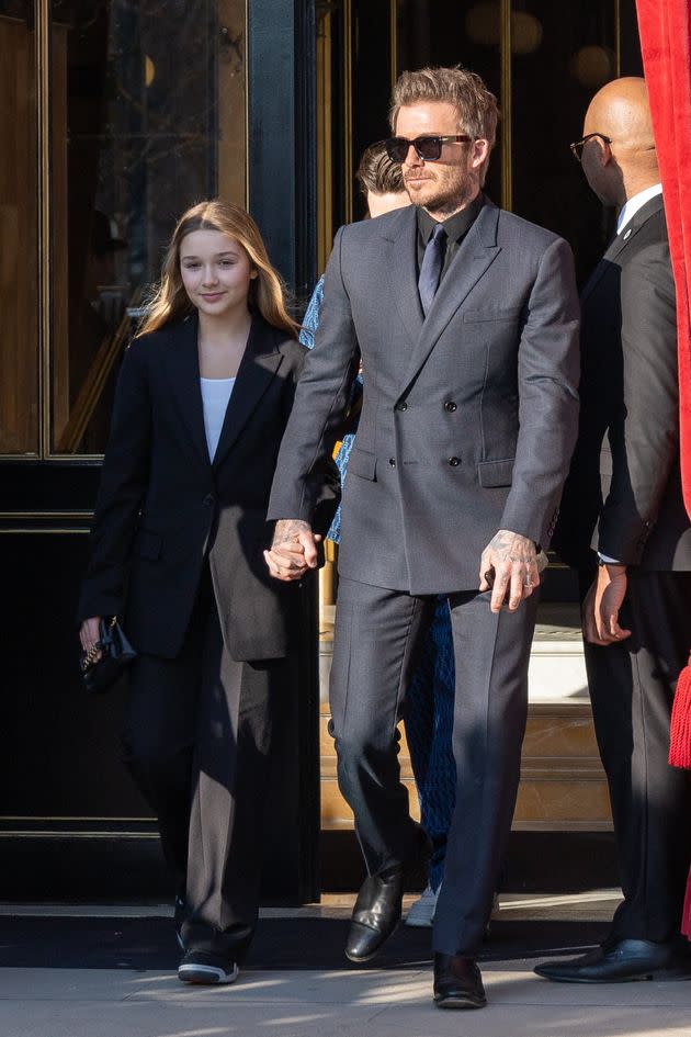 (L-R) Harper Beckham and David Beckham are seen on March 03, 2023 in Paris, France. (Photo by Marc Piasecki/GC Images)