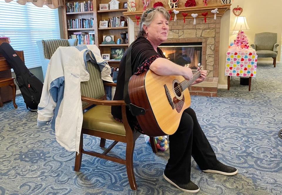 Music therapist Valerie Jones shares music with residents of Brookdale Senior Living center in Bloomington as part of an IU Auditorium program in February 2024.