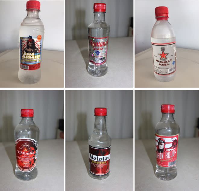 Products with labels reading "Guaro Gran Apache," "Red Star Brandy," "Guaro Montano," " Aguardiente Bar&oacute;n Rojo," " Aguardiente Timbuka," and "Aguardiente Molotov" were found adulterated with methanol, Costa Rica's health ministry said. (Photo: Costa Rican Ministry of Health)