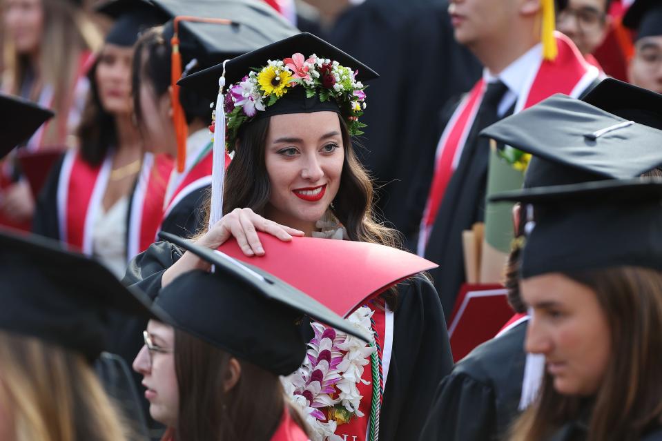 Tonya Addison walks with other graduates during the University of Utah’s commencement in Salt Lake City on Thursday, May 4, 2023. With 8,723 graduates, it is the largest group of graduates in the school’s history. | Jeffrey D. Allred, Deseret News