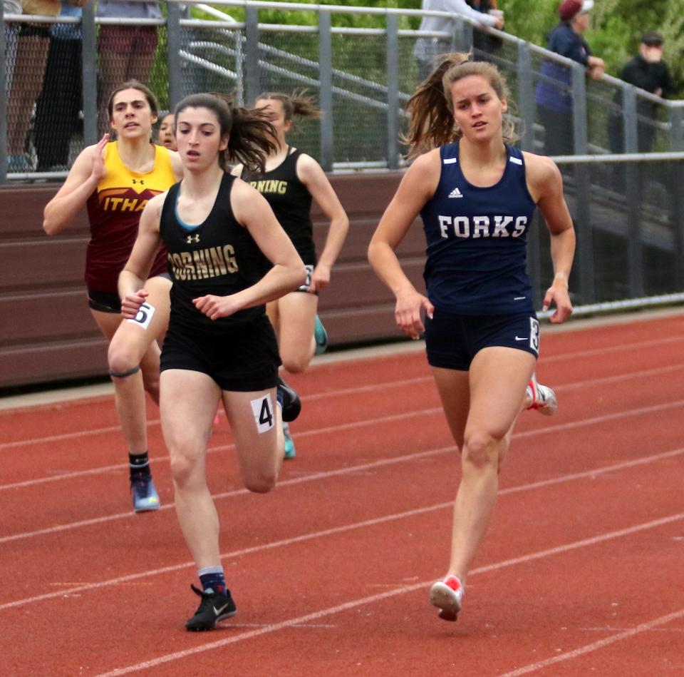 Chenango Forks' Pipher Reid, right, runs to first place in the girls 400-meter dash at the Southern Tier Athletic Conference track & field championships May 18, 2022 at Johnson City High School.