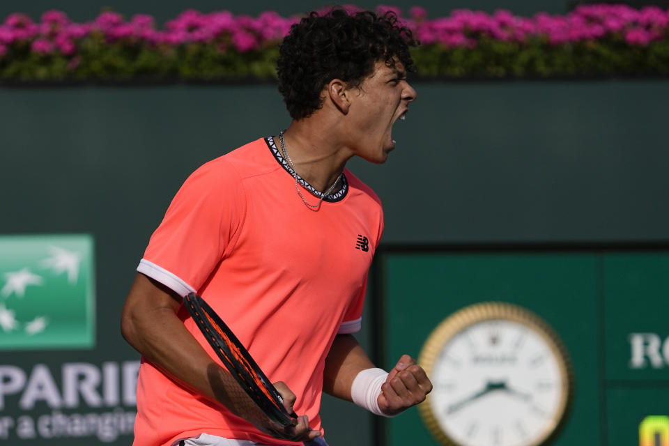 Ben Shelton reacts after winning the fist set against Taylor Fritz at the BNP Paribas Open tennis tournament Saturday, March 11, 2023, in Indian Wells, Calif. (AP Photo/Mark J. Terrill)