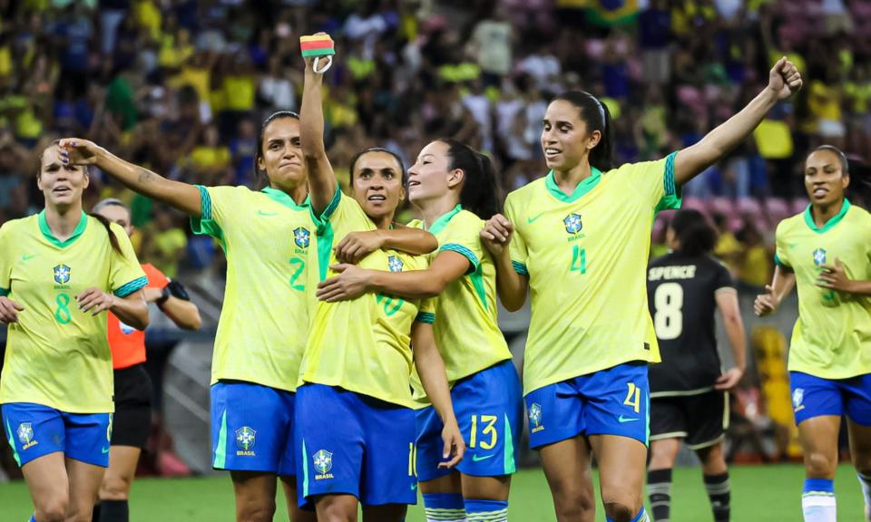 <span>Marta celebrates with her <a class="link " href="https://sports.yahoo.com/soccer/teams/brazil-women/" data-i13n="sec:content-canvas;subsec:anchor_text;elm:context_link" data-ylk="slk:Brazil;sec:content-canvas;subsec:anchor_text;elm:context_link;itc:0">Brazil</a> teammates after scoring against <a class="link " href="https://sports.yahoo.com/soccer/teams/jamaica/" data-i13n="sec:content-canvas;subsec:anchor_text;elm:context_link" data-ylk="slk:Jamaica;sec:content-canvas;subsec:anchor_text;elm:context_link;itc:0">Jamaica</a> in a friendly earlier this month.</span><span>Photograph: Eurasia Sport Images/Getty Images</span>