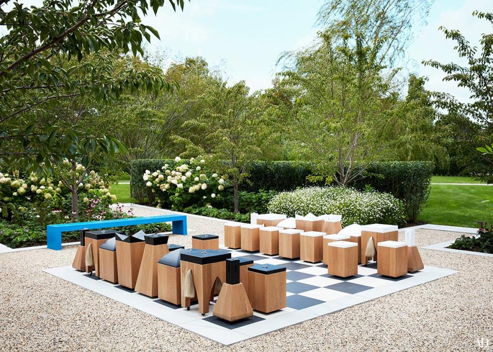 The garden features a bespoke oak, horsehair, and stainless-steel chess set.