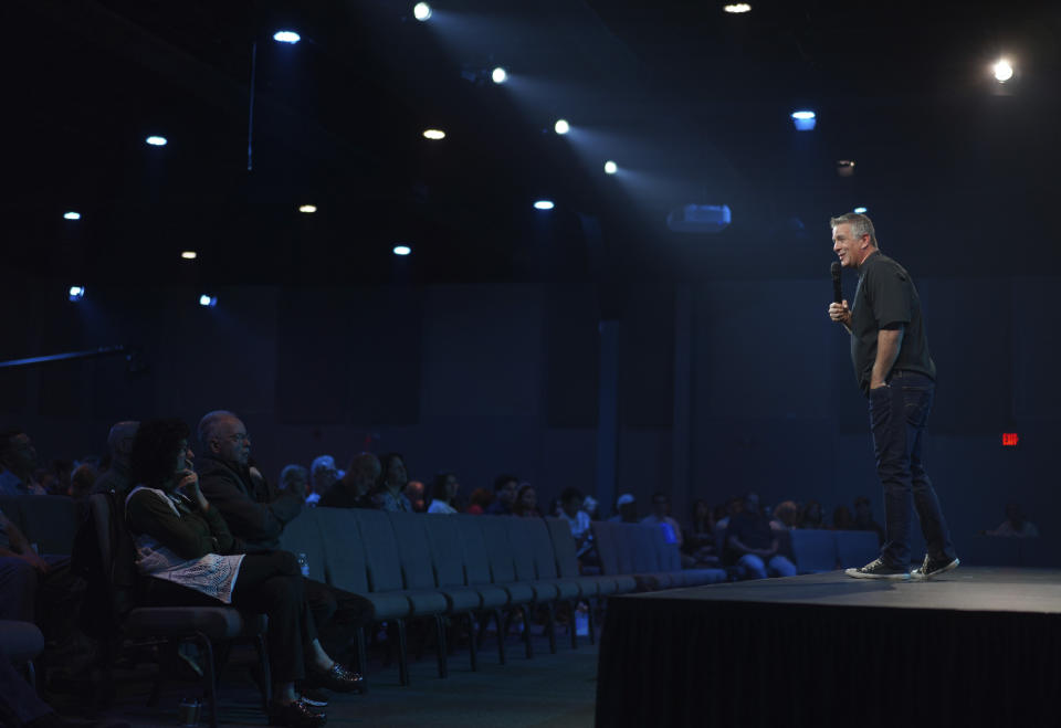 Lead pastor Jeff Leake of Allison Park Church gives his sermon during service on Sunday, Nov. 6, 2022, in Allison Park, Pa. Leake began his message by encouraging his congregation to head to the polls on Tuesday for the midterm elections. (AP Photo/Jessie Wardarski)