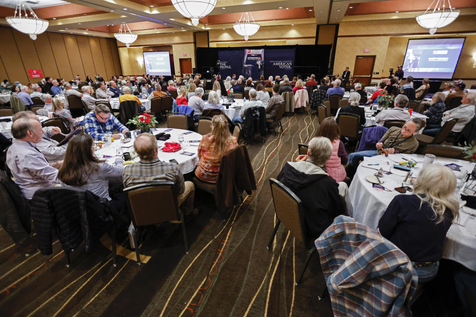 Participants listen as Gary Humble, executive director of Tennessee Stands speaks during an Election Conspiracy Forum Saturday, March 11, 2023, in Franklin, Tenn. (AP Photo/Wade Payne)