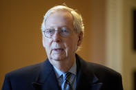 FILE - Senate Minority Leader Mitch McConnell, R-Ky., speaks to a reporter at the Capitol in Washington, Wednesday, Jan. 19, 2022. McConnell's comment, "African American voters are voting at just as high a percentage as Americans," made a Yale Law School librarian's list of the most notable quotations of 2022. (AP Photo/Amanda Andrade-Rhoades, File)