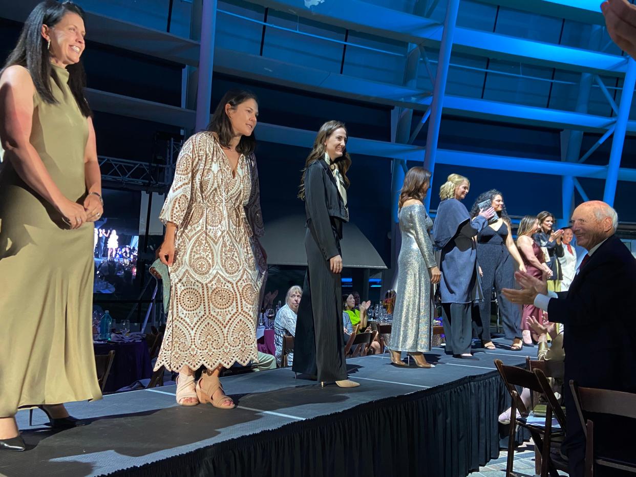 Oklahomans model attire featured at Oklahoma Israel Exchange's "Fashionably Tied" event at the First Americans Museum in Oklahoma City.