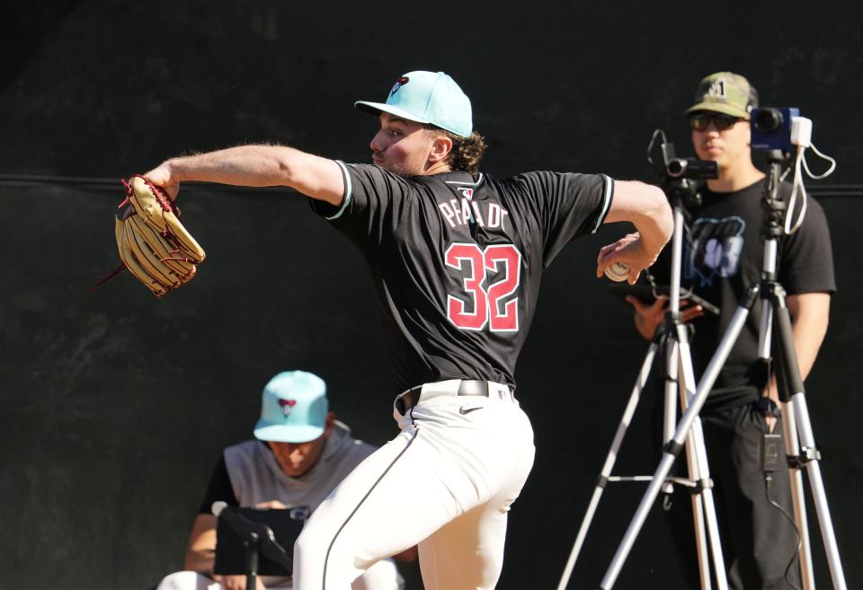 Arizona Diamondbacks pitcher Brandon Pfaadt throws in the bullpen during spring training workouts at Salt River Fields at Talking Stick in Scottsdale on Feb. 14, 2024.